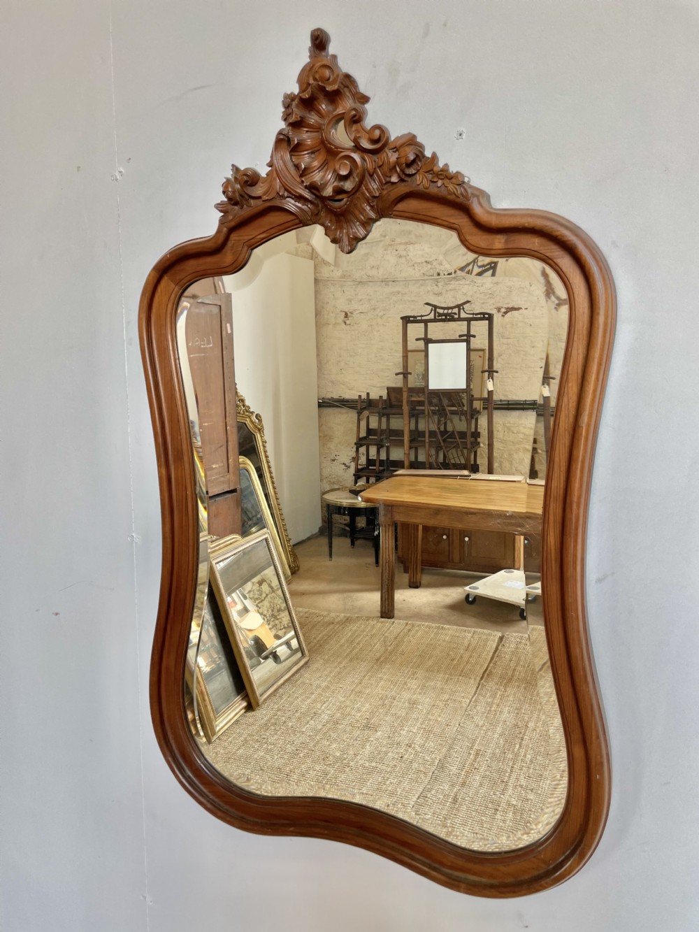 Louis XVI style walnut wall mirror 