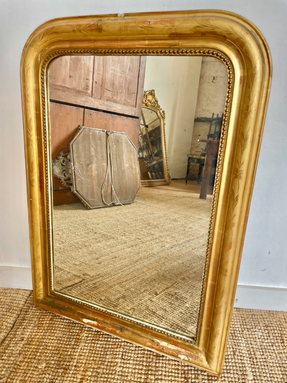 Arched topped gilt wood mirror 