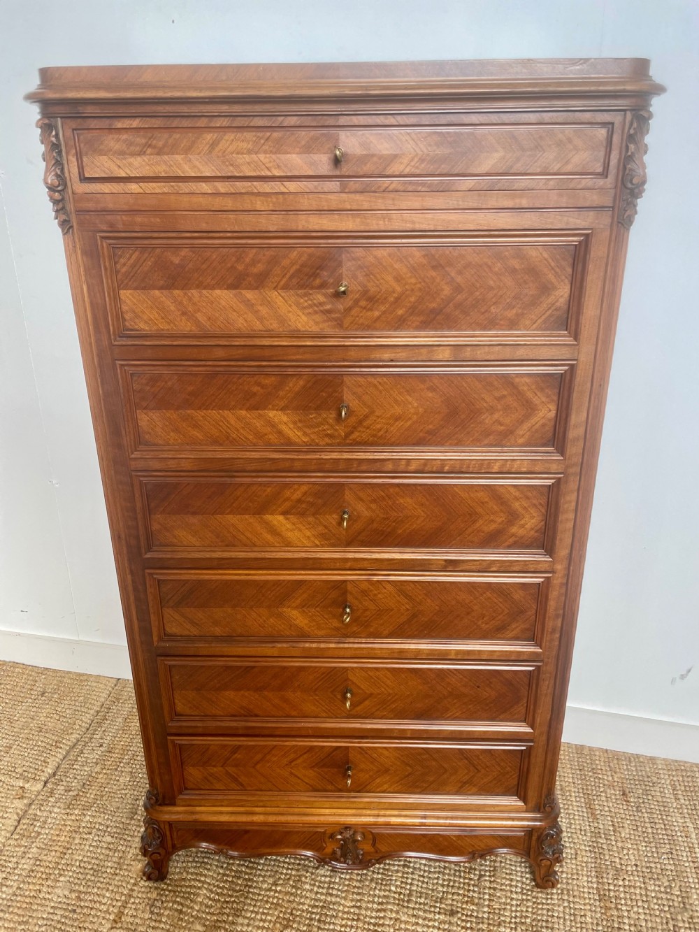 Tall narrow walnut chest of drawers