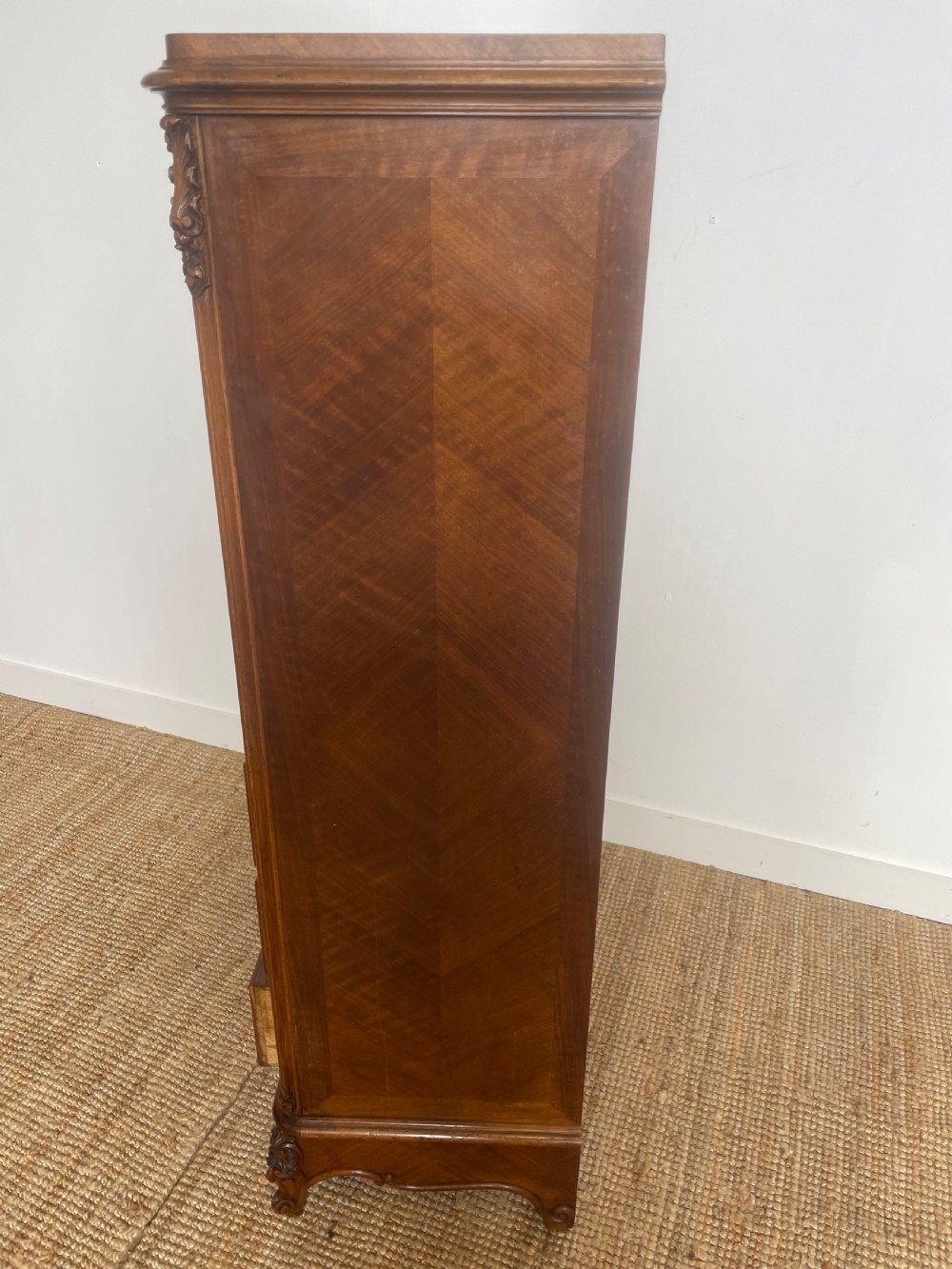 Tall narrow walnut chest of drawers View X