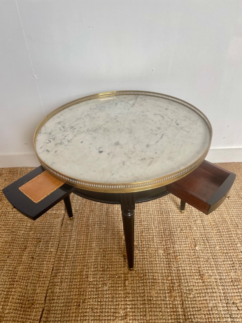 Small round ebonised coffee table View II