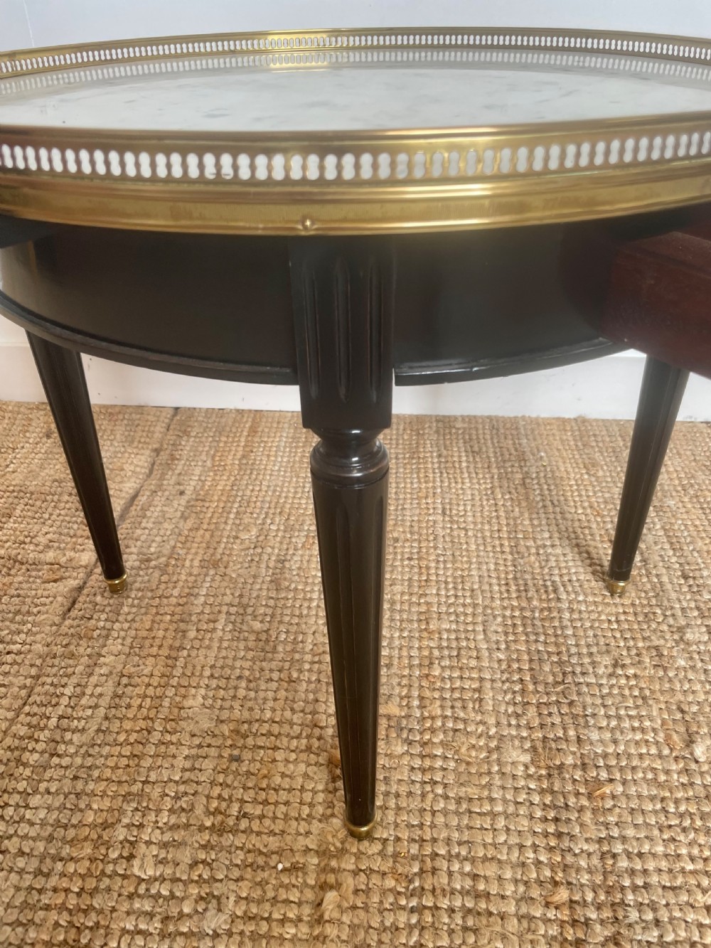 Small round ebonised coffee table View III