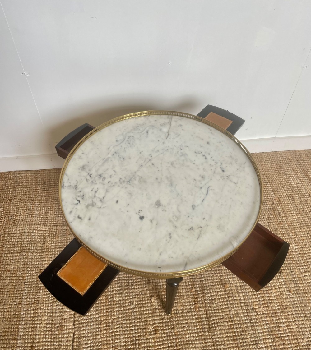 Small round ebonised coffee table View IV