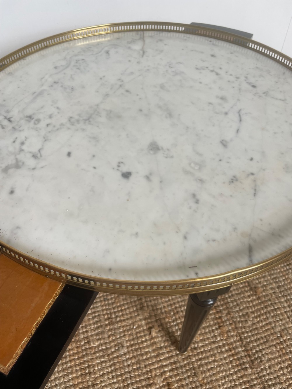 Small round ebonised coffee table View VI