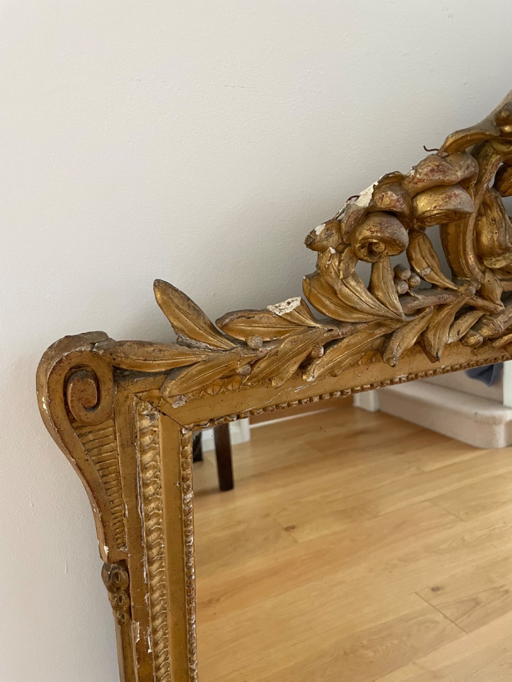 Gilt mirror, with ornate cresting  View II