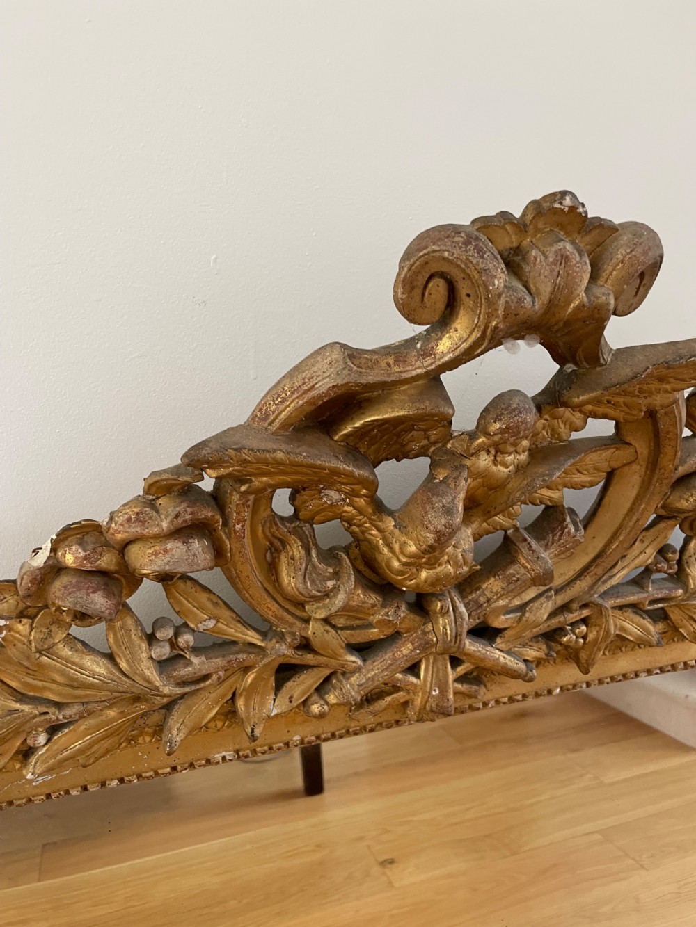 Gilt mirror, with ornate cresting  View III