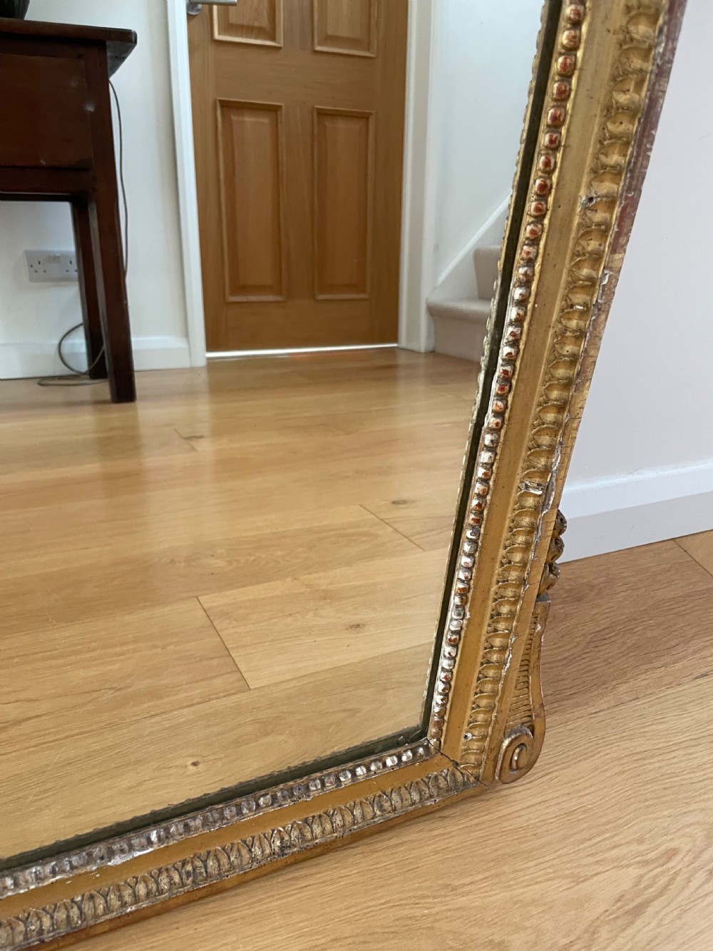 Gilt mirror, with ornate cresting  View VI