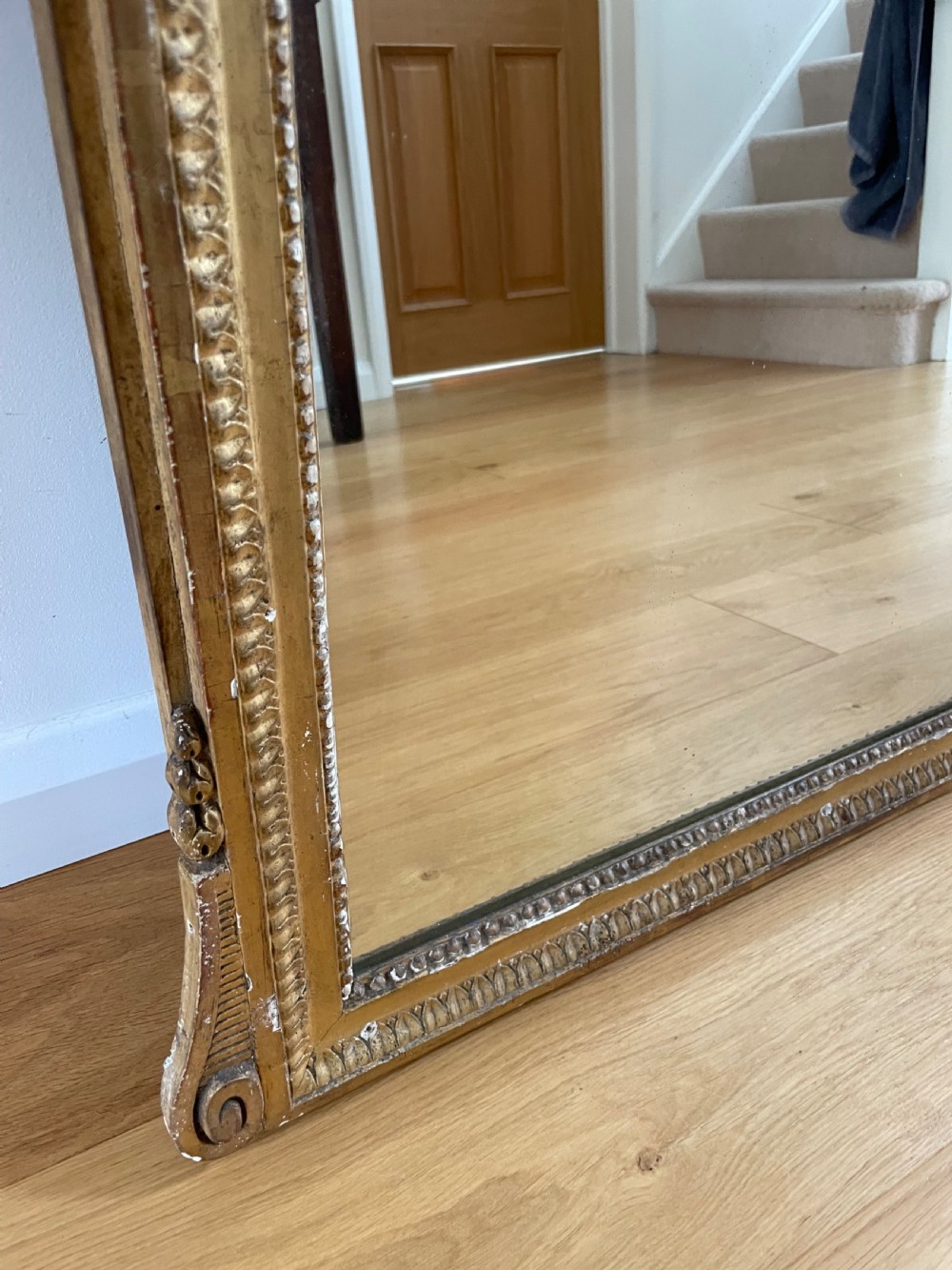Gilt mirror, with ornate cresting  View VII