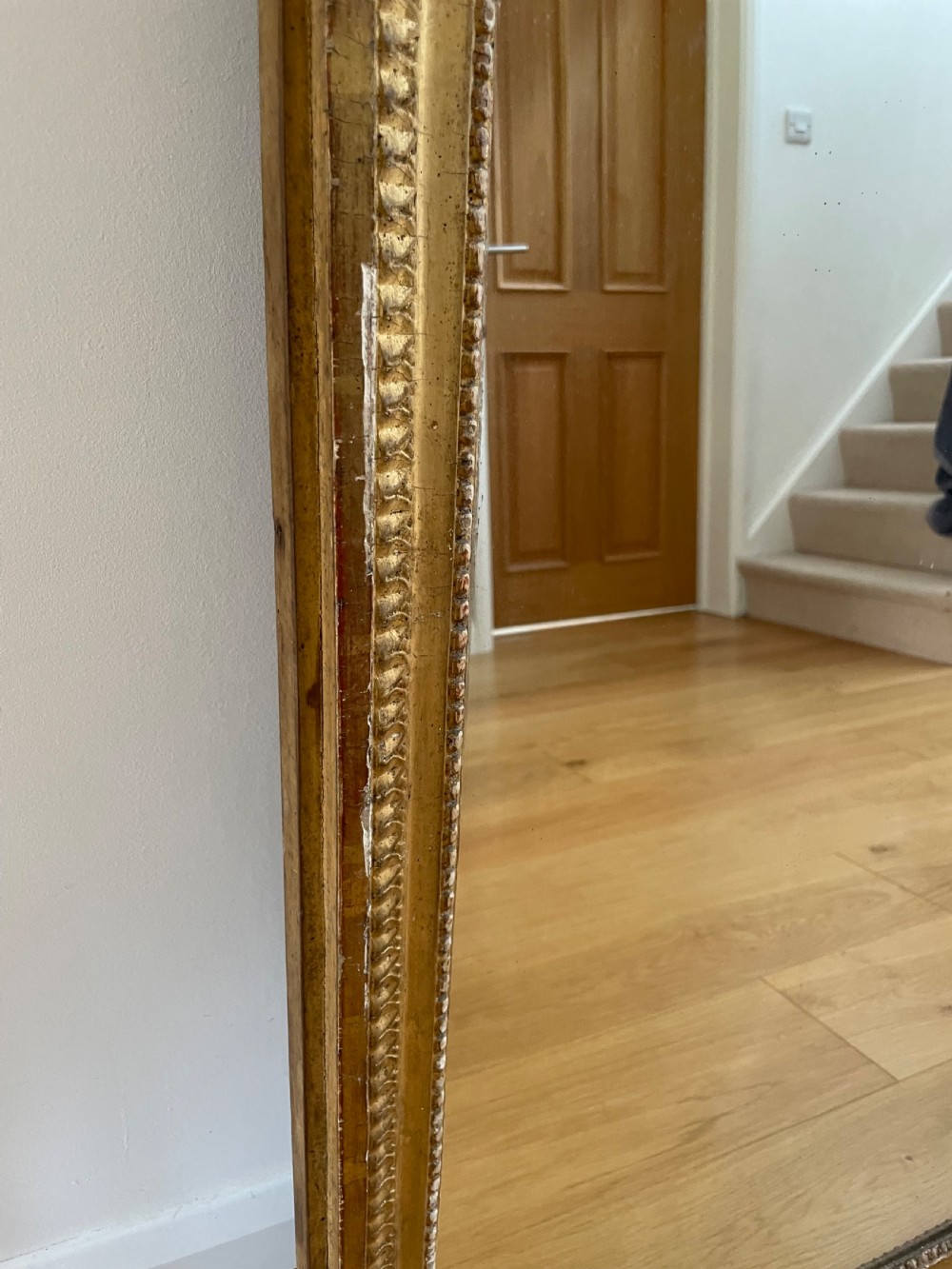 Gilt mirror, with ornate cresting  View VIII