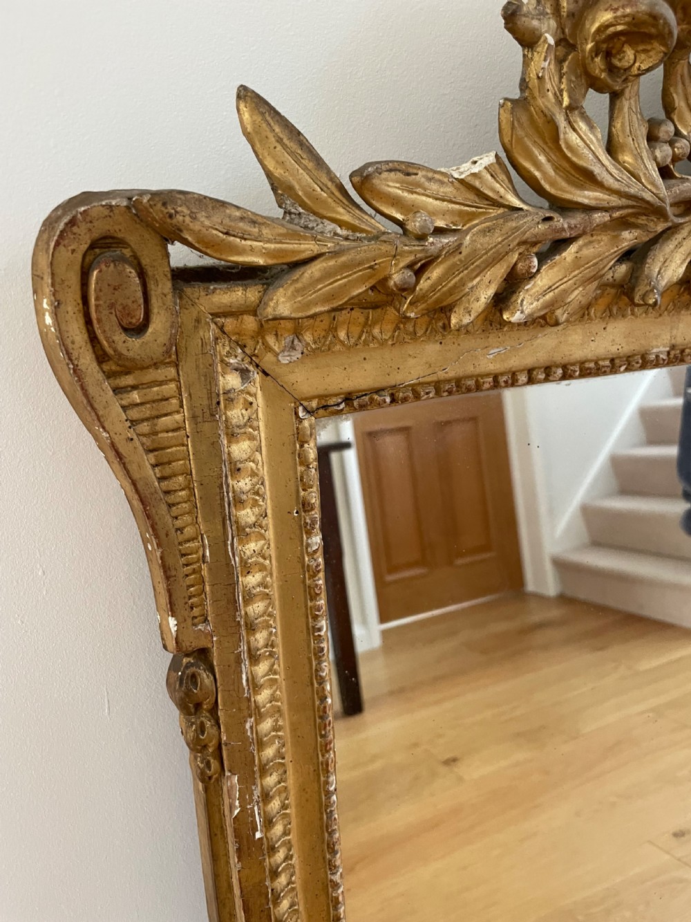 Gilt mirror, with ornate cresting  View IX