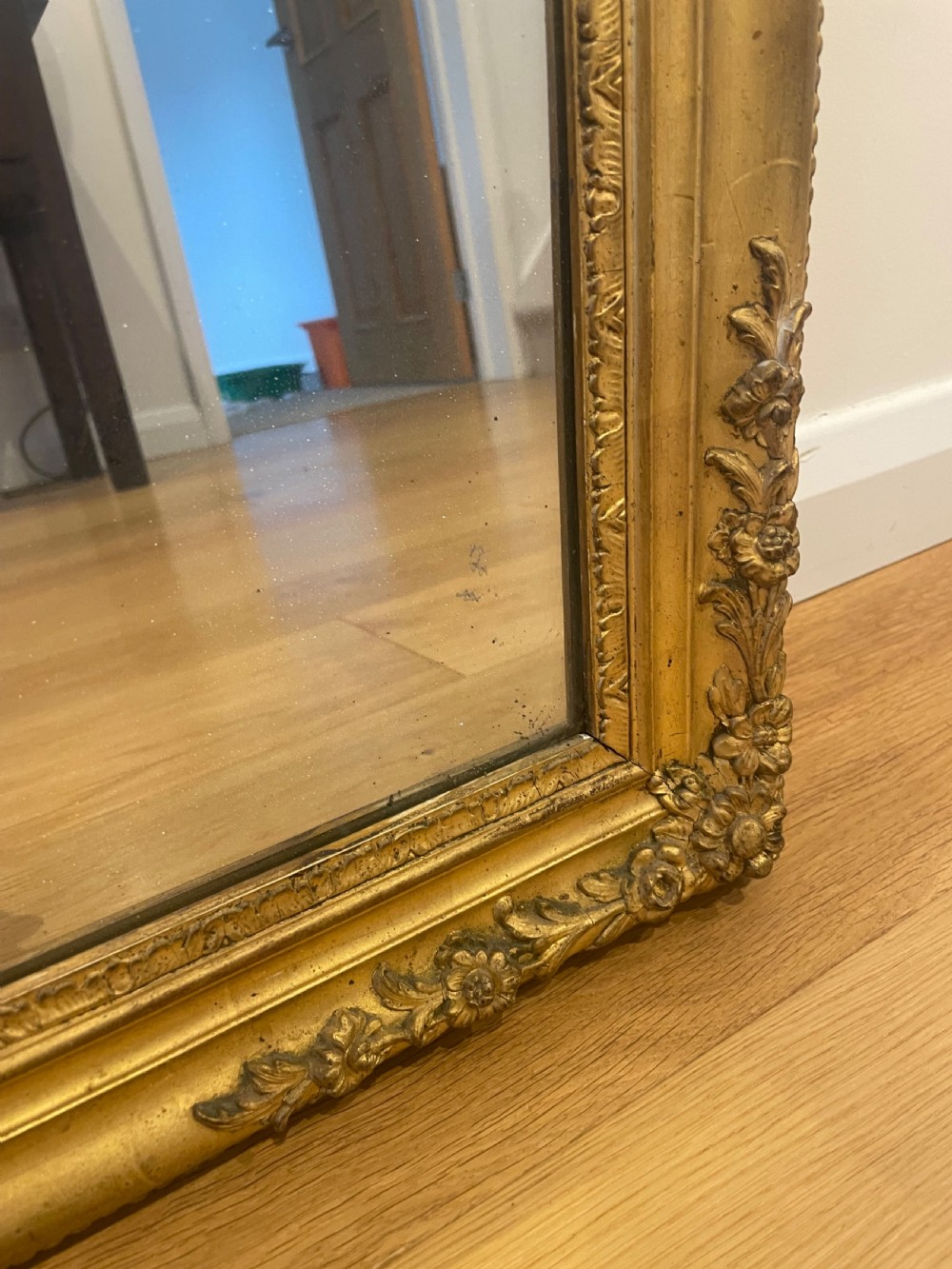 Small antique gilt mirror with floral decoration  View VI