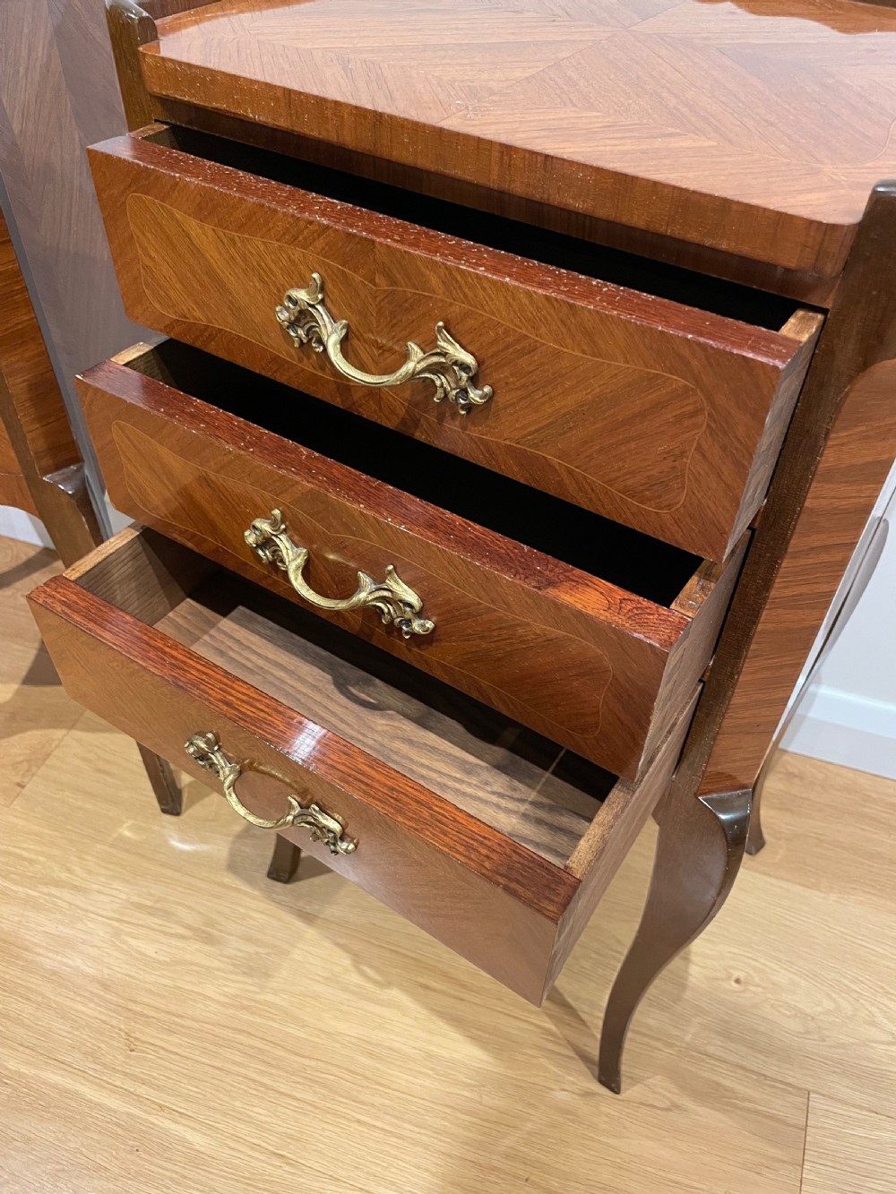 Pair of king wood and mahogany bedside cabinets  View V
