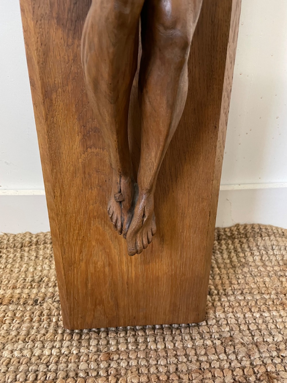 A large Art Deco style carved oak crucifix featuring a detailed wooden figure of Jesus Christ mounted on a broad-armed cross. View V
