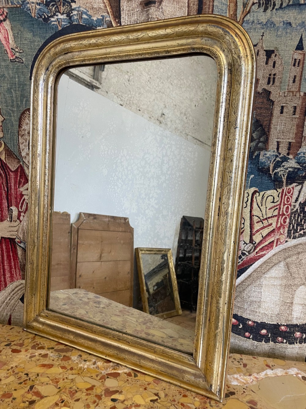Small arched top gilt mirror 