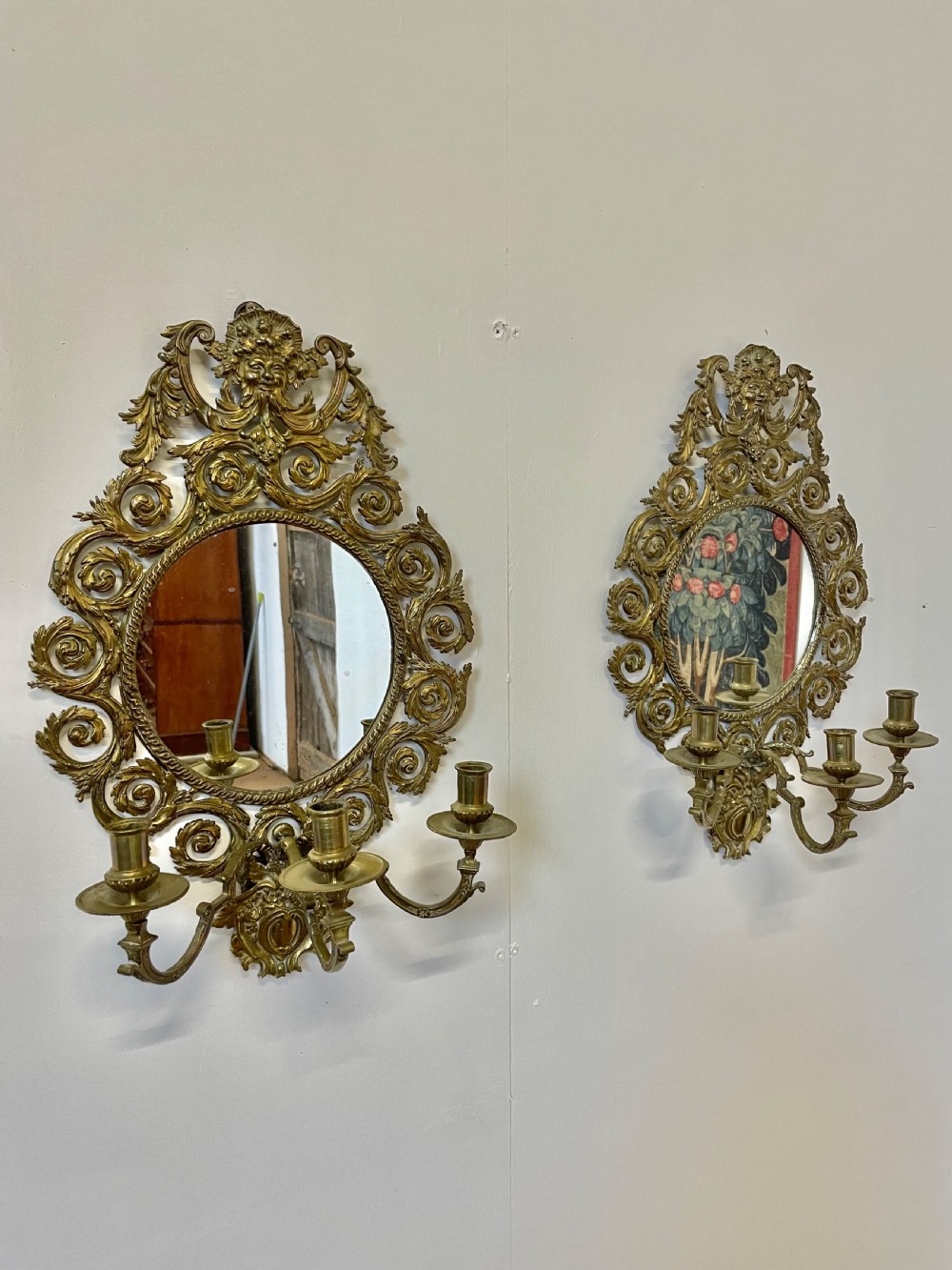 Pair of brass Girandole mirrors 