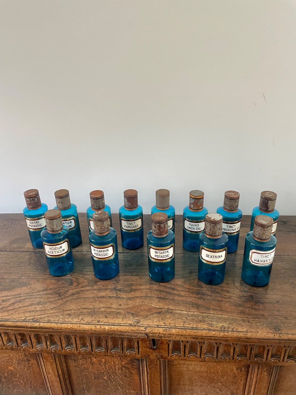 Collection of 13 Blue glass apothecary bottles 
