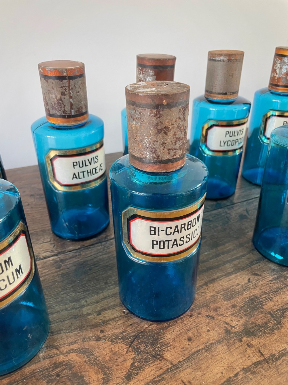 Collection of 13 Blue glass apothecary bottles  View V