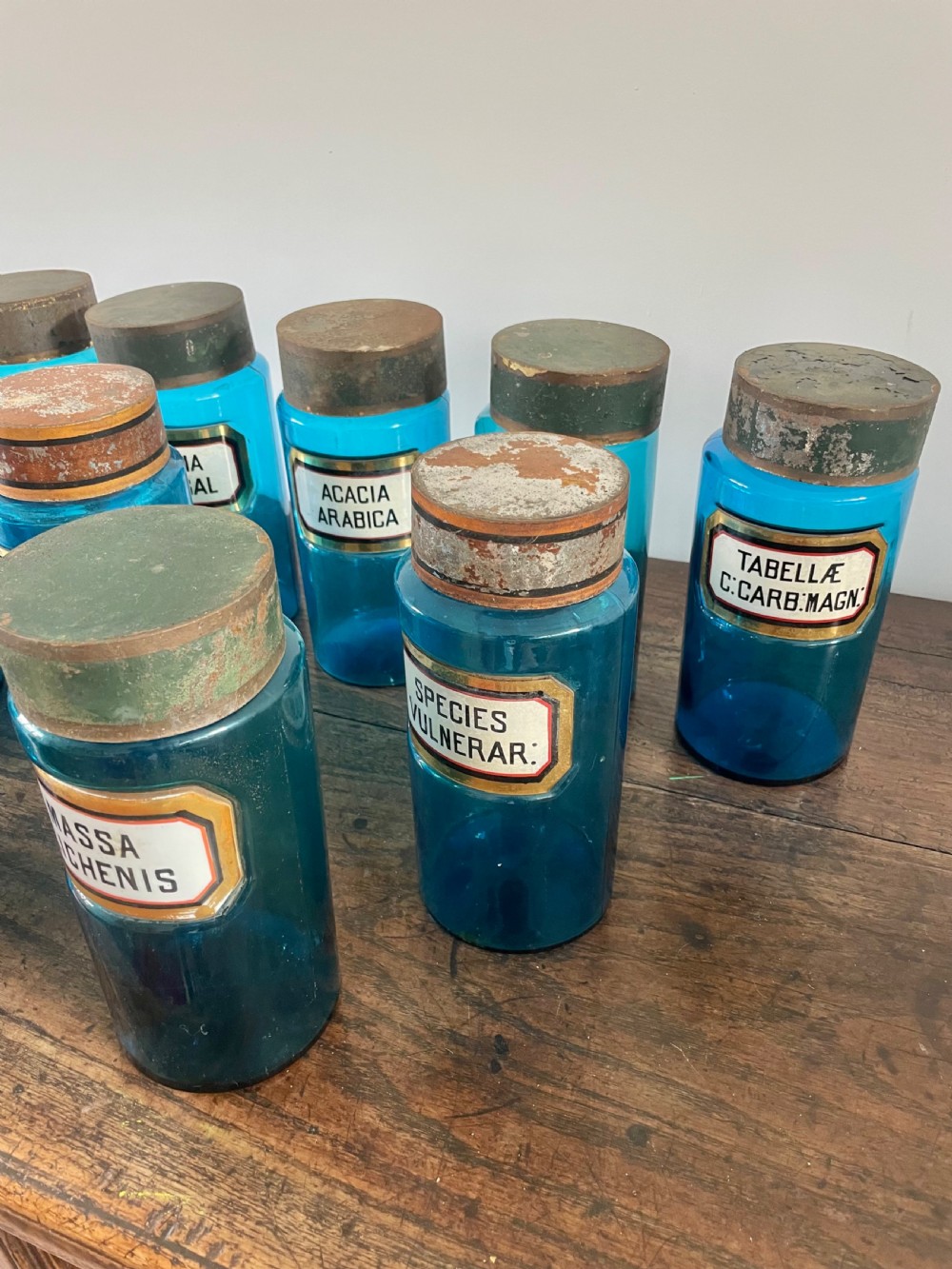 Collection of 11 blue glass apothecary bottles  View II