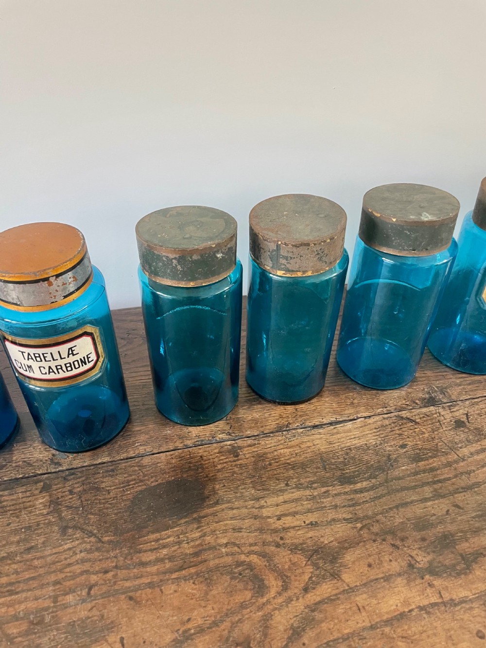 Collection of 11 blue glass apothecary bottles  View IX