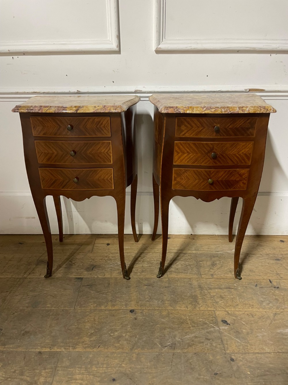 Pair of marble topped bedside cabinets 