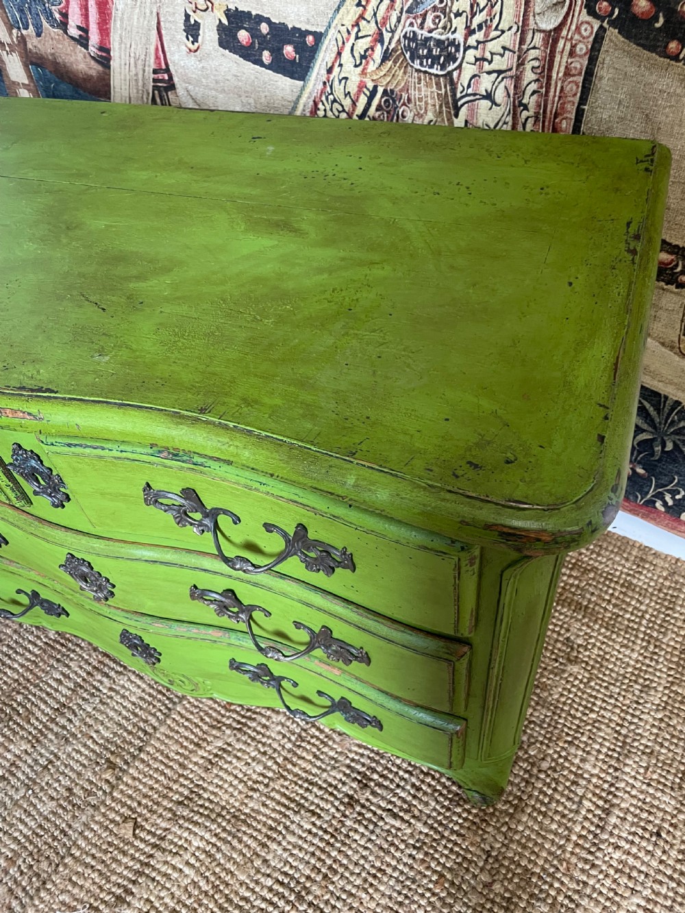 A green painted wooden commode chest of drawers featuring curved cabriole legs and brass hardware. View V
