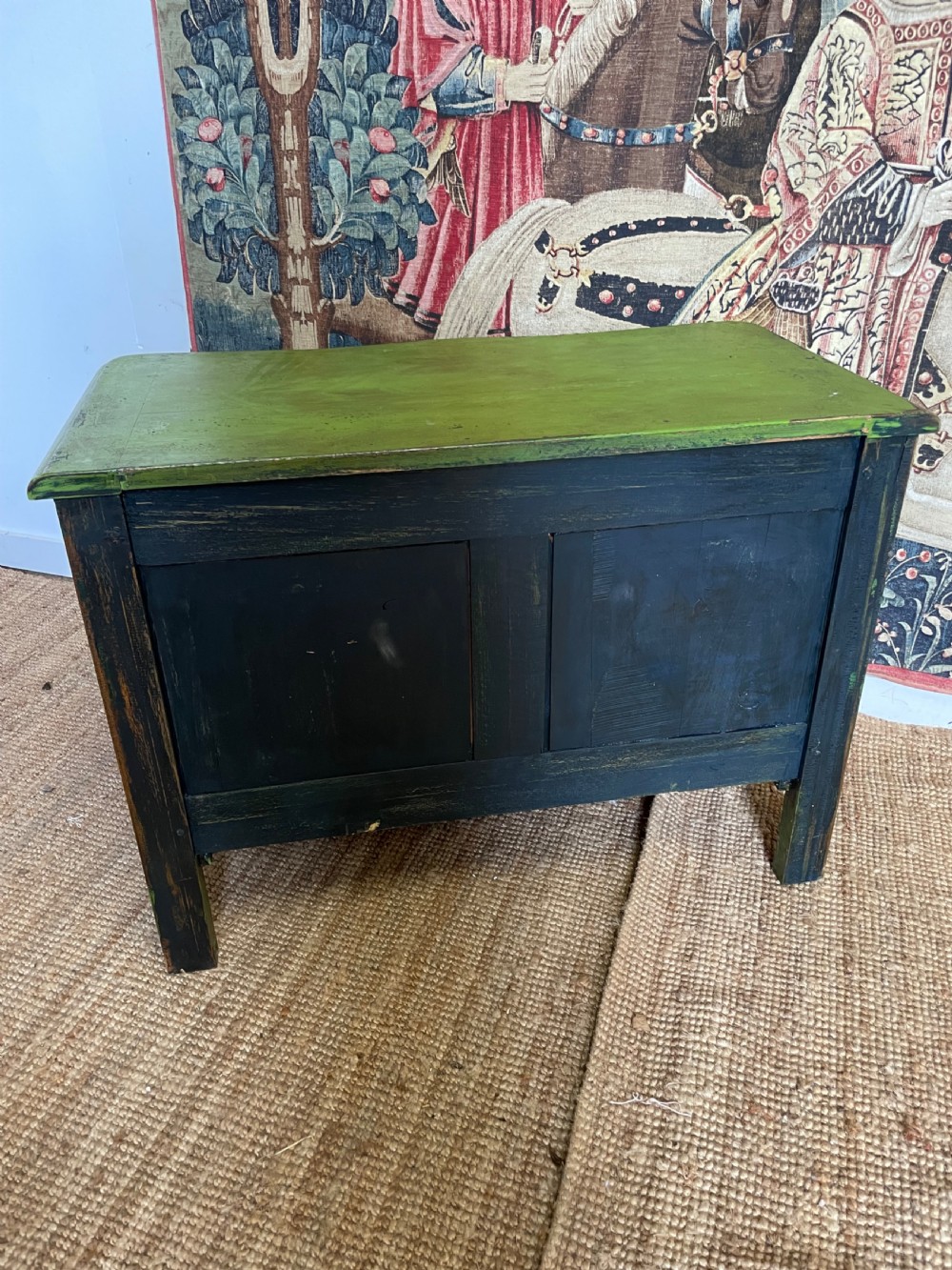 A green painted wooden commode chest of drawers featuring curved cabriole legs and brass hardware. View X