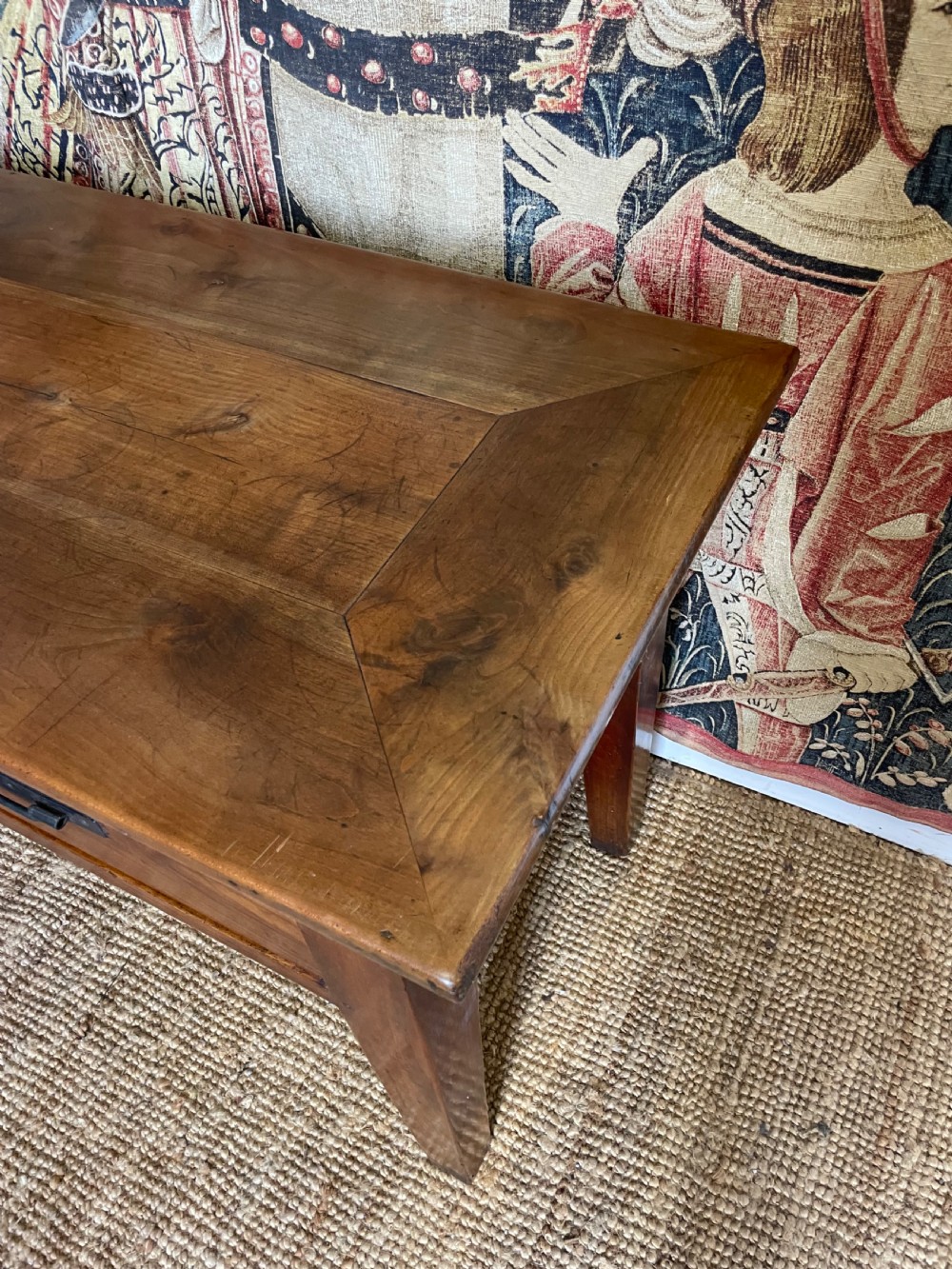 A rectangular cherrywood dresser base featuring three drawers with metal drop handles and straight tapered legs. View V