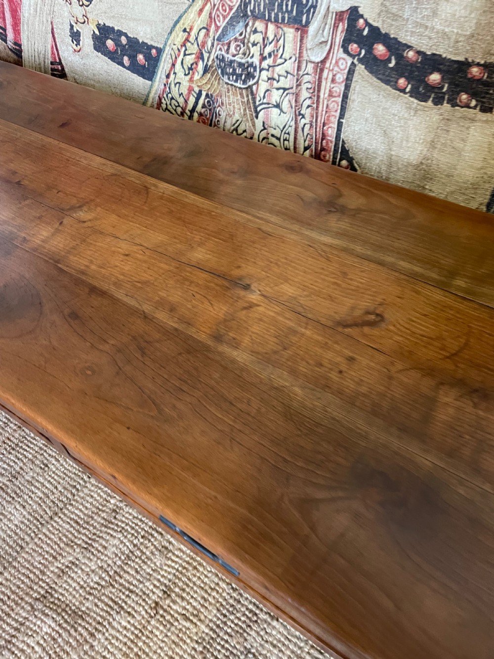 A rectangular cherrywood dresser base featuring three drawers with metal drop handles and straight tapered legs. View VI