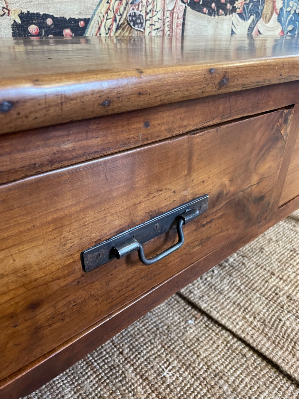 A rectangular cherrywood dresser base featuring three drawers with metal drop handles and straight tapered legs. View VIII