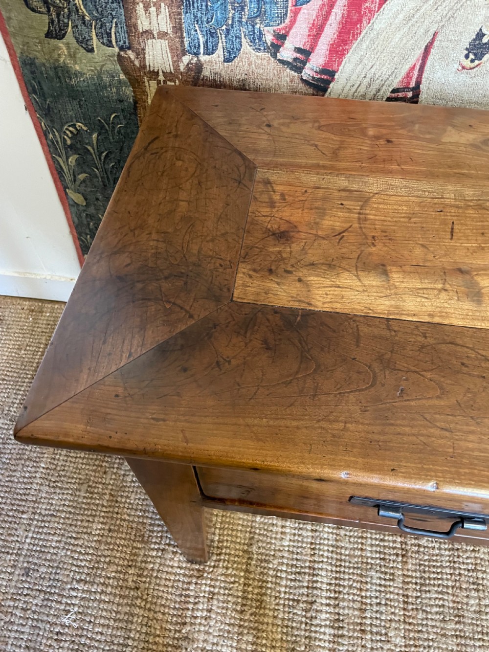A rectangular cherrywood dresser base featuring three drawers with metal drop handles and straight tapered legs. View XI