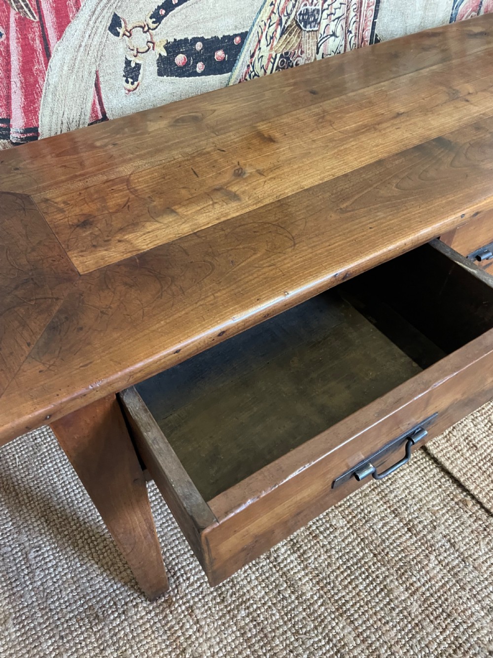A rectangular cherrywood dresser base featuring three drawers with metal drop handles and straight tapered legs. View XIV