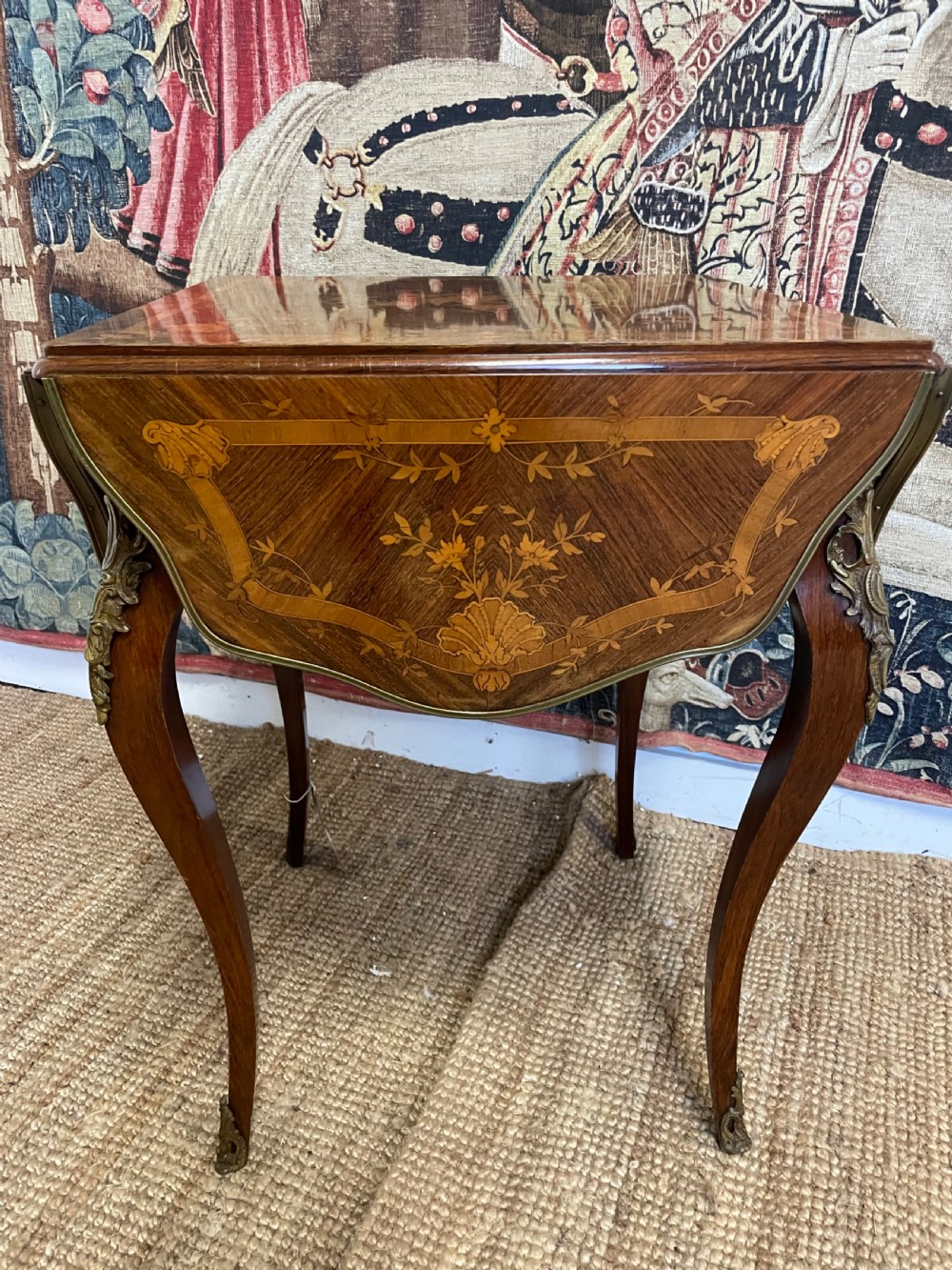 A square French Napoleon III rosewood side table featuring intricate floral marquetry inlay, cabriole legs, and brass mounts. View III