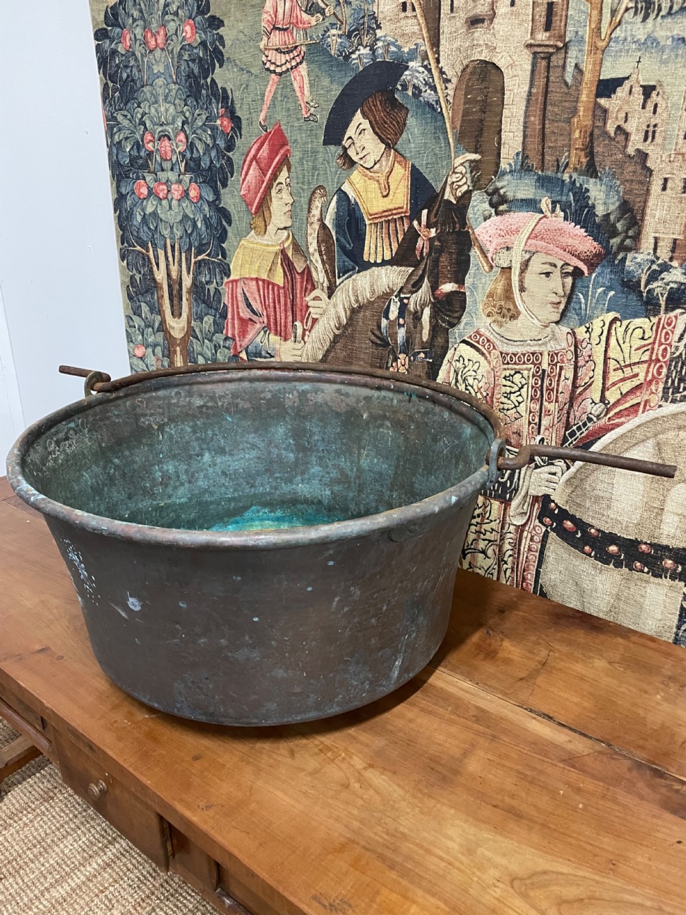 A large 19th-century copper log bin featuring wrought iron side handles and a verdigris green interior patina. View II