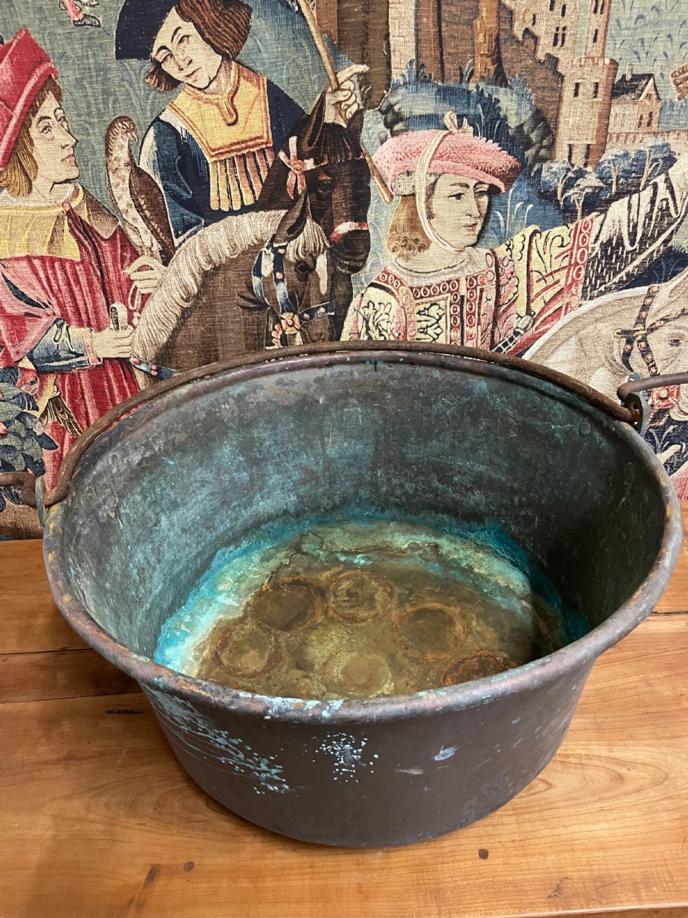 A large 19th-century copper log bin featuring wrought iron side handles and a verdigris green interior patina. View V