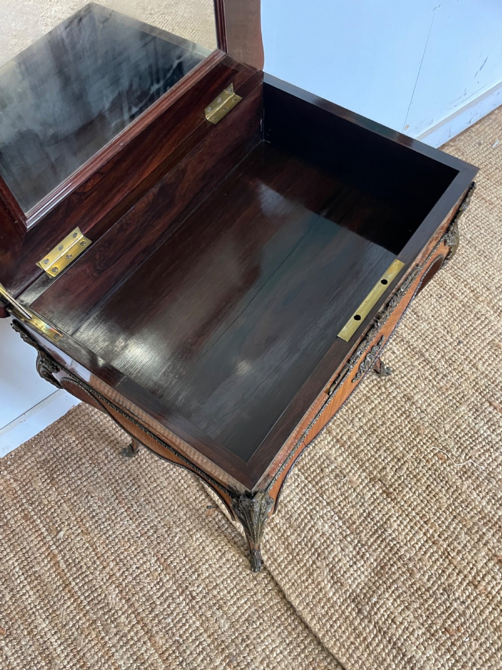 A 19th-century French Napoleon III kingwood worktable featuring parquetry top surface, serpentine cabriole legs, and cast brass mounts. View IX