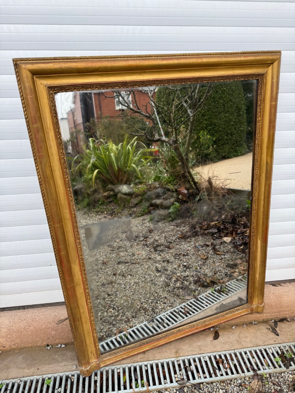 Neat sized 19th century antique gilded over mantle mirror 