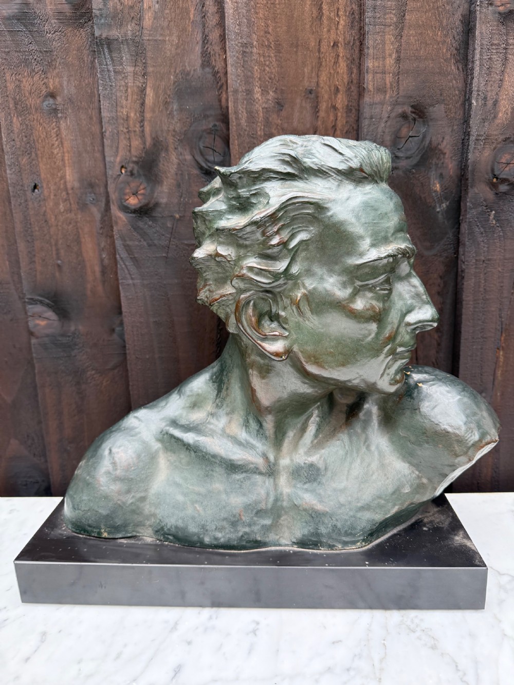 Art Deco terracotta bust of a man , J Dommisse 