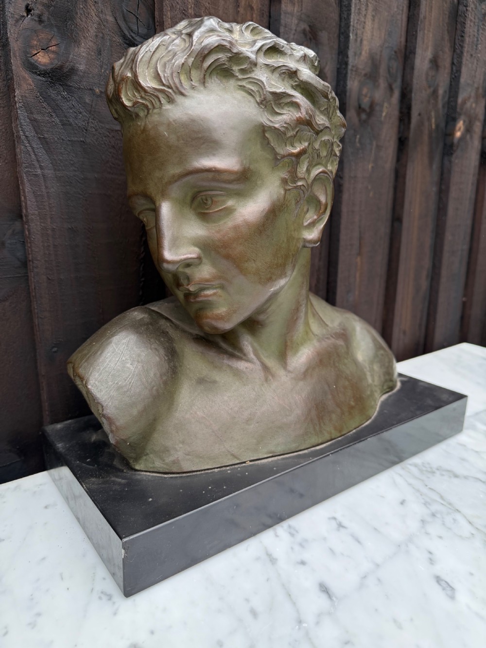 Art deco terracotta bust of a boy , J Dommisse  View II