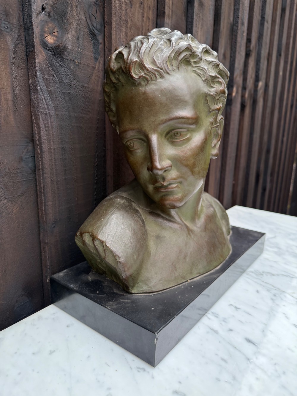 Art deco terracotta bust of a boy , J Dommisse  View III