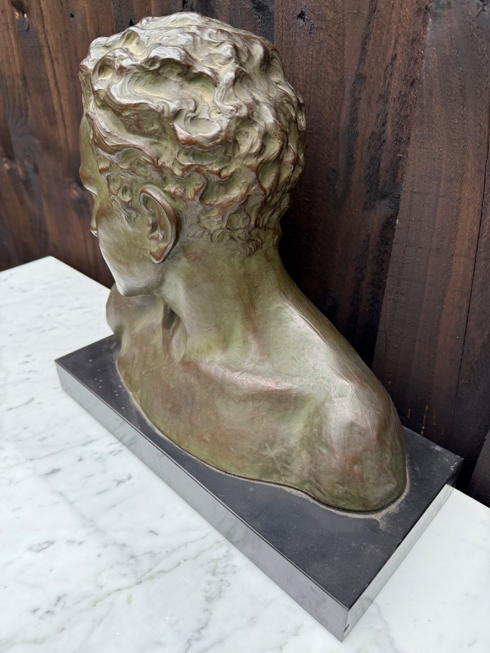 Art deco terracotta bust of a boy , J Dommisse  View VI