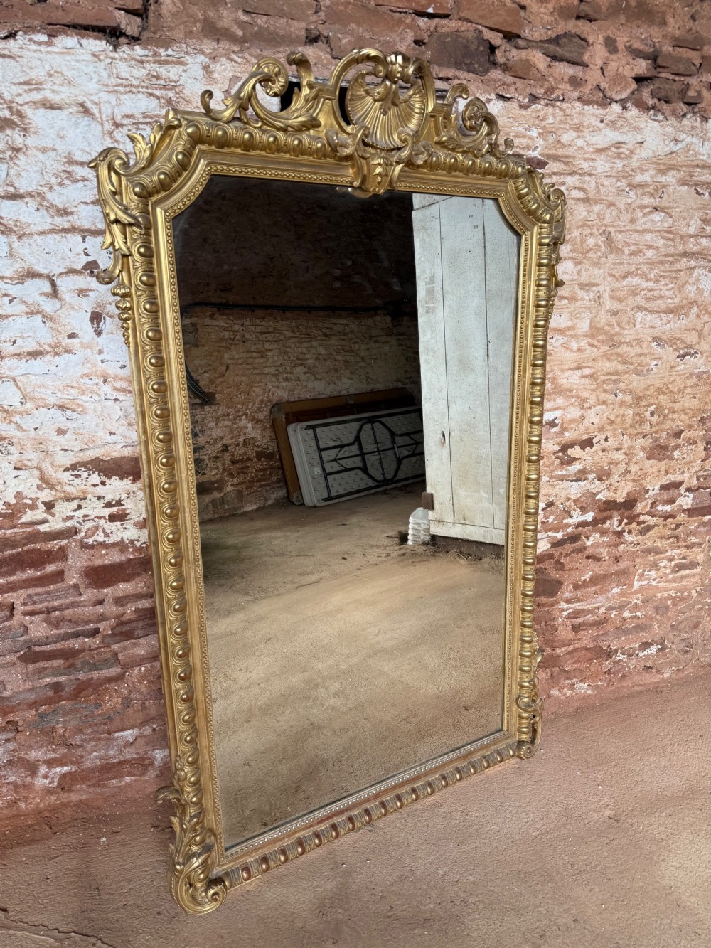 Large antique gilt overmantle mirror
