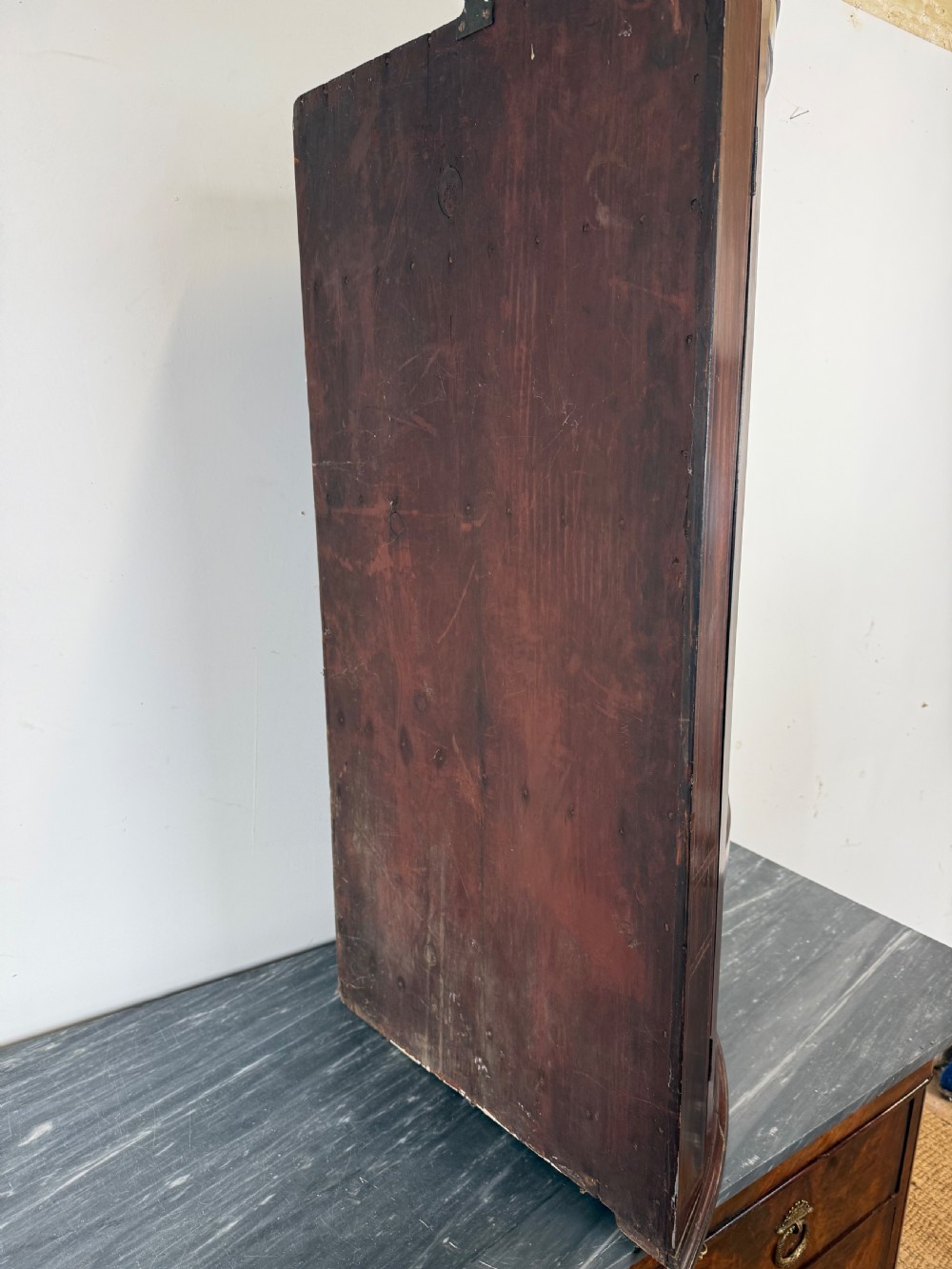 A Georgian mahogany bow-fronted corner cupboard featuring curved twin panelled doors, dentil moulding, and central marquetry inlay. View XIII