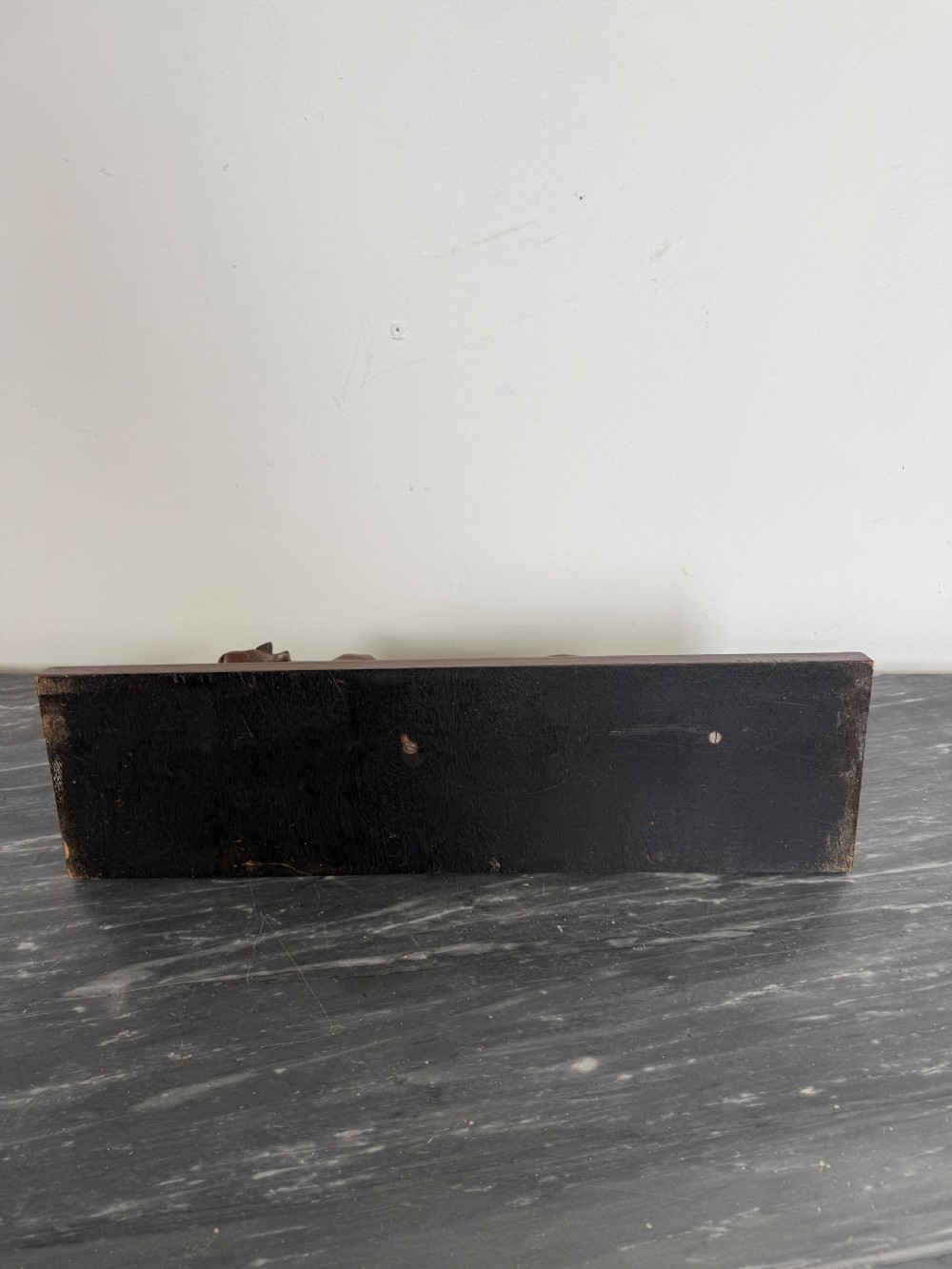 A carved dark wood Art Deco sculpture depicting a prowling panther mounted on a matching rectangular timber base. View VIII