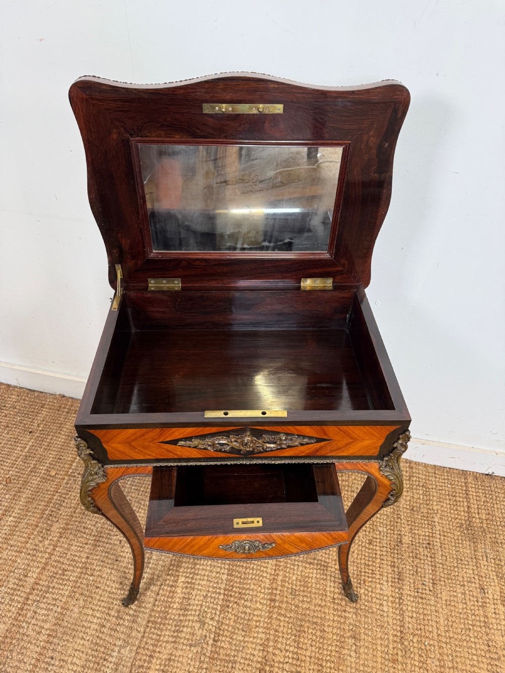 A 19th-century French Napoleon III work table with diamond geometric parquetry, gilt bronze mounts, and cabriole legs. View VII