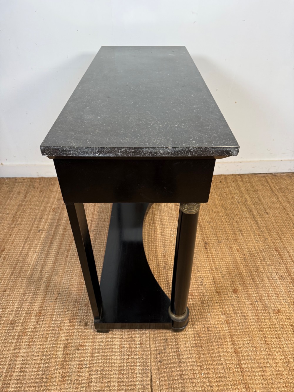 Ebonised console table in the empire style View X