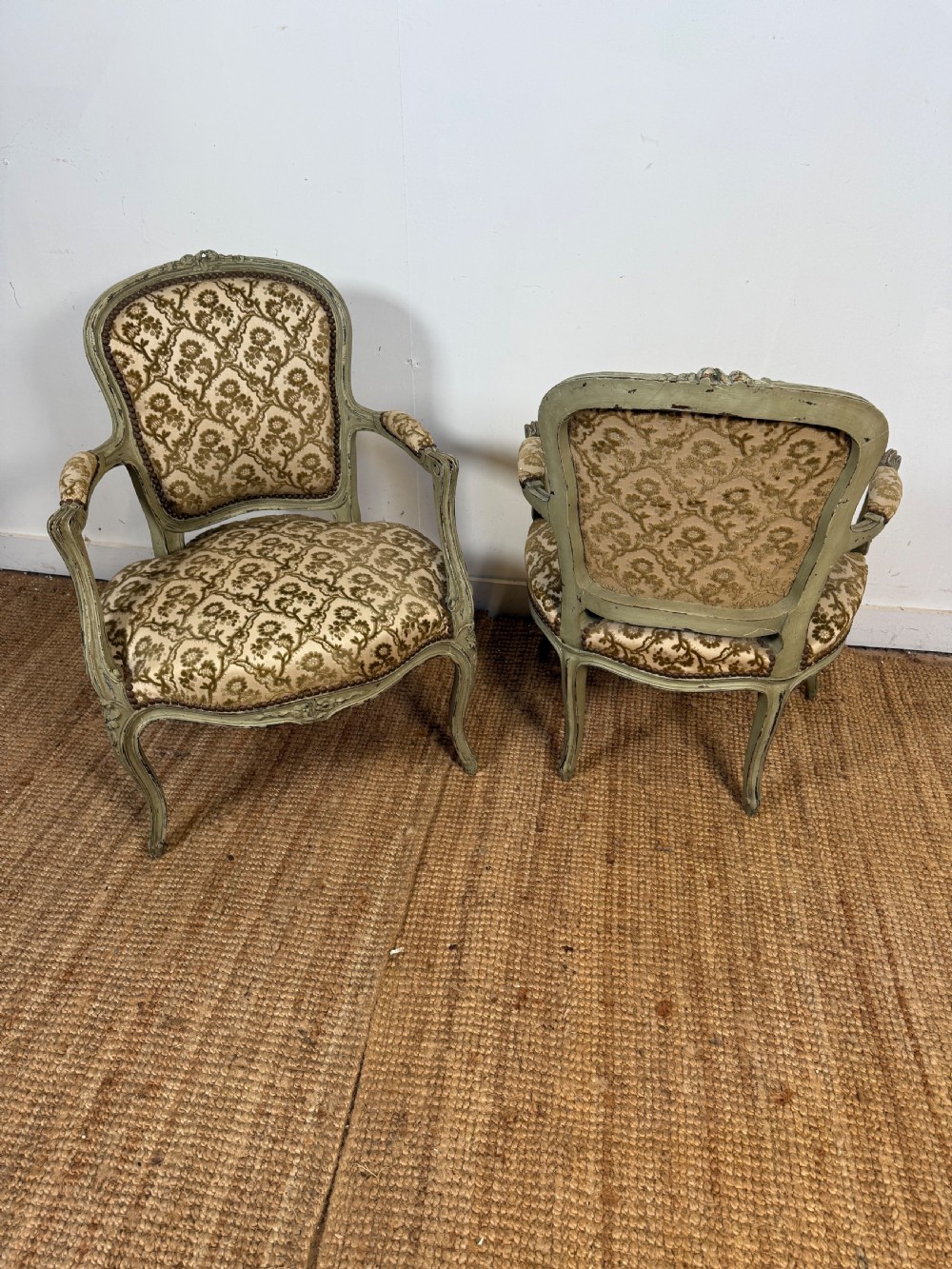A pair of late 19th-century French style open armchairs with carved muted green painted frames and patterned velvet fabric. View IX