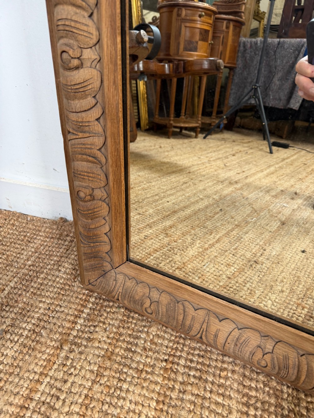 A large rectangular 19th-century wall mirror featuring a wide, hand-carved scrubbed oak frame with foliate border detailing. View VII