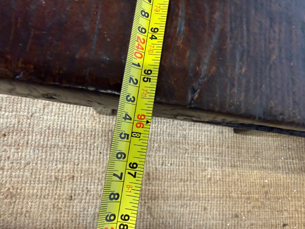 A long 18th century dark oak farmhouse dining table with a thick plank top and square legs. View XIII