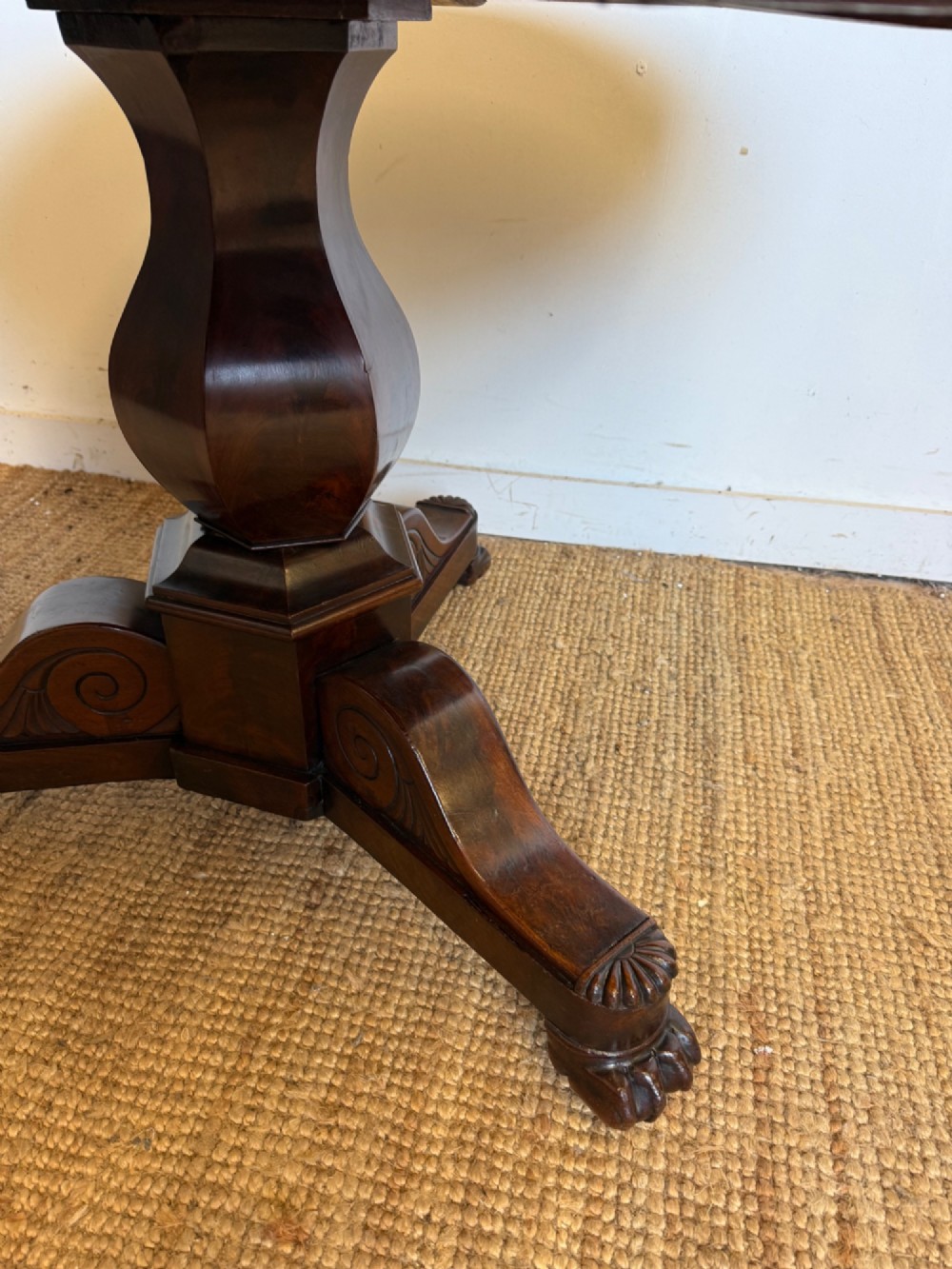 A 19th-century circular centre table featuring a white marble top set on a dark mahogany turned pedestal with a scroll-footed tripod base. View IV
