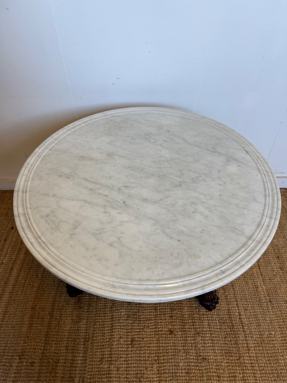 A 19th-century circular centre table featuring a white marble top set on a dark mahogany turned pedestal with a scroll-footed tripod base. View VII